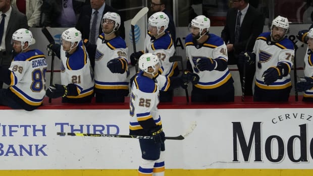 Feb 27, 2022; Chicago, Illinois, USA; St. Louis Blues center Jordan Kyrou (25) celebrates his goal against the Chicago Blackhawks during the second period at United Center. Mandatory Credit: David Banks-USA TODAY Sports